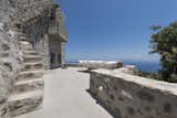 Stay at a Greek Island Villa Among the Ruins of a 14th-Century Castle - Photo 1 of 12 - 