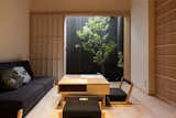 Built more than 100 years ago, these two traditional townhouses in Kyoto were restored and transformed into modern, clean-lined serviced apartments.