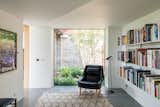 Office, Library Room Type, Chair, Lamps, and Terrazzo Floor  Photo 9 of 12 in window by Molly E. Osler, Interior Design from Explore a Prefabricated House For Sale in England That's Clad With Cor-Ten Steel
