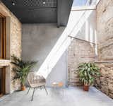 This Double-Height Apartment in 
 Barcelona Features Historic Details and a Floating Staircase - Photo 8 of 12 - 