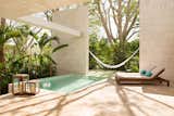 A 19th Century estate in the Yucatán jungle was given new life as a modern Mexican hotel with villa-style abodes with bath tubs of polished rock and casitas with their own pool and outdoor showers.  Photo 1 of 7 in 7 Modern Hotels in Mexico You Have to Visit
