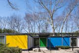 In 1958, architect Emil Tessin designed the Frost House, a midcentury, steel-frame prefab with bold colors, a powerful geometric form, and interiors by Knoll and Paul McCobb.