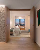 In London’s Barbican estate, Conran and Partners have transformed a 17-story 1960s iconic British Brutalist building intp 74 apartments with fit outs of pick-hammered concrete, ceramic tile and terrazzo, timber floors, and refined brassware.