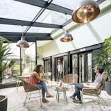 On the sixth floor of Airbnb’s Paris office is a bright, plant-filled solarium where staff can relax and socialize. Designed by Airbnb in collaboration with STUDIOS Architecture, the space has all the relaxed breeziness of a Parisian attic loft.