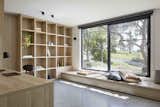 Office, Library Room Type, Study Room Type, Chair, Storage, Shelves, Desk, Bookcase, and Lamps  Photos from A Remodel Turns a Dark and Choppy House in Melbourne Into a Bright, Flexible Family Home