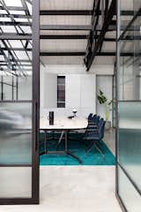 Office, Study Room Type, Chair, Storage, Concrete Floor, and Rug Floor  Photo 11 of 14 in An Art Deco Warehouse in Melbourne Is Converted Into a Shared Office Space