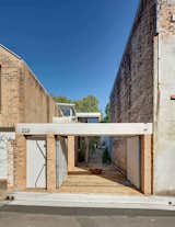 House Building Type, Brick Siding Material, Concrete Siding Material, Outdoor, and Front Yard  Ian Zunt’s Saves from Find Out How Light and Precious Outdoor Space Were Introduced to an Old Australian Cottage