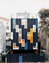 Architect Lorcan O’Herlihy designed this home just off Pacific Avenue with a dark blue facade and a dazzling display of colored windows for his wife and himself.