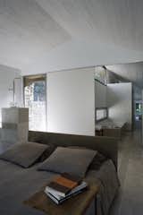 Bedroom and Bed  Photo 12 of 14 in An Abandoned Stable in Spain Is Transformed Into a Sustainable Vacation Home For Rent