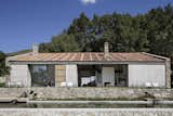 Exterior, Barn, Tile, Wood, Stone, House, and Farmhouse  Exterior Wood Farmhouse Tile Barn Photos from An Abandoned Stable in Spain Is Transformed Into a Sustainable Vacation Home For Rent
