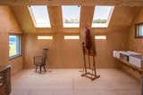 Shed & Studio, Living Room Room Type, and Living Space Room Type Interior of Midden Studio in Scotland.  Photos from 10 Prefabricated or Modular Structures That Use Plywood in Creative Ways
