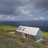 Though not made of stone or brick like the other homes in this roundup, this two-person escape designed by Rural Design Architects on Scotland’s Isle of Skye was made with corrugated metal, a material that's commonly used for agricultural sheds or "crofters cottages" in the rural areas of Scotland.