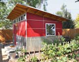 When a Colorado web designer’s newborn daughter was given his home office, he moved his workspace to this quaint shed made with ruby-red Collins Truwood Siding and corrugated metal.