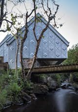 Futuristic yet traditional, this little holiday retreat prefab in the western coast of Scotland makes a bold statement using just zinc and plywood.