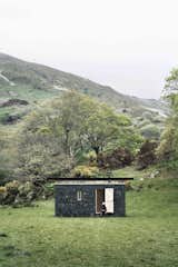 With a facade made of recycled slate tiles that were reclaimed from nearby farms, this writer’s retreat on the edge of Snowdonia National Park in Mid Wales offers not only plenty of solitude, but also natural inspiration, thanks to the lush green valleys and windswept hills of the Welsh countryside. It was designed by Sydney-based architecture firm TRIAS.