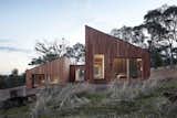Exterior, House Building Type, Wood Siding Material, and Shed RoofLine  Photos from A Bushland Home in Melbourne That's Divided Between Two Pavilions