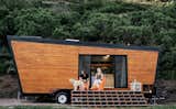 Nicknamed "Woody," this 236-square-foot trailer has taken a young, upwardly-mobile couple from Austin, Texas, to the Rocky Mountains hamlet of Marble, Colorado. Built at a cost of just around $50,000, the trailer was fitted with modern birch-veneer plywood and skylights, and has a half-size refrigerator, eight-inch-deep storage compartments built into the floor, a loft bed, and even a galvanized-steel cow trough bathtub.