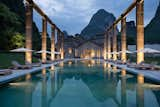 An old sugarcane dock was turned into a swimming pool, which offers views of the Karst mountains and Li River from a distance.