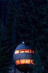 Exterior, Cabin Building Type, Curved RoofLine, and Wood Siding Material  Photo 20 of 79 in Ideas by John from These Tree Houses in the Dolomites Look Like Egg-Shaped Pinecones