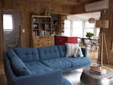 Living Room, Sectional, Coffee Tables, Pendant Lighting, Floor Lighting, and Medium Hardwood Floor  Photo 15 of 17 in Enjoy the Rest of Fall by Renting One of These Cozy Cabins or Tree Houses