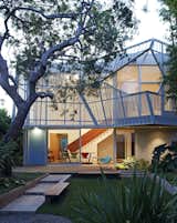 Kevin Daly Architects created a perforated, folding metal skin supported by an aluminum exoskeleton that shades the two-story glazed facade of this home in Venice, California.