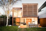 To create the feel of a seaside retreat, Mitsuori Architects included Australian Ironbark wood slats on the rear-facing wall of this rorenovated this Victoiran heritage home in Melbourne. Ironbark is an incredibly durable hardwood that turns a beautiful silvery-gray as it weathers over time.