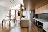 Kitchen and Medium Hardwood Floor  Photo 5 of 12 in A Cool Melbourne Cottage Riffs Off of its Victorian Neighbors