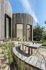 Stay in This Danish Vacation Home Made Up of 9 Log-Clad Cylinders - Photo 3 of 14 - 