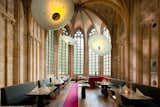 This renovated, 15th-century monastery of the "Crutched Friars" is now the 60-room Kruisherenhotel Maastricht hotel, where tall cathedral windows bring in tons of light and add historic grandeur to the restaurant, which was previously the monastery’s old church.