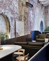 A former power station in Melbourne’s city center was repurposed into Higher Ground, a chic restaurant with six new connected levels. Melbourne-based studio DesignOffice preserved the old building’s large arched windows and nooks.