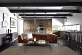 Living, Sofa, Coffee Tables, Stools, Console Tables, End Tables, Ceiling, Track, Dark Hardwood, and Carpet  Living Track Carpet Sofa Dark Hardwood Photos from One of Melbourne's Oldest Prefab Timber Cottages Gets a Second Chance