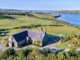 Exterior, House Building Type, Shingles Roof Material, Gable RoofLine, and Stone Siding Material  Photo 12 of 14 in 7 Vacation Rentals in Ireland That Put a Spin on the Classic Cottage