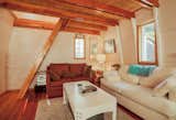 Living Room, Sofa, Coffee Tables, and Medium Hardwood Floor  Photo 8 of 16 in 8 Outstanding Cabins For Rent in Canada