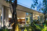 Doors, Exterior, Metal, and Sliding Door Type  Photos from A Concrete Home in Brazil Lets the Owners Practically Live in the Jungle