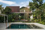 Outdoor, Trees, Plunge Pools, Tubs, Shower, Walkways, Hardscapes, and Concrete Patio, Porch, Deck  Photo 6 of 13 in A Concrete Home in Brazil Lets the Owners Practically Live in the Jungle