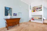 Living Room, Bookcase, Light Hardwood Floor, Table Lighting, Console Tables, and Wall Lighting  Carlos del Solar’s Saves from 8 Marvelous Apartments You Should Absolutely Rent in Milan