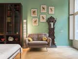 Bedroom, Bookcase, Light Hardwood Floor, Floor Lighting, Chair, and Bed  Photos from 8 Marvelous Apartments You Should Absolutely Rent in Milan