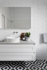 Bath Room, Subway Tile Wall, Engineered Quartz Counter, Vessel Sink, and Porcelain Tile Floor  Photo 8 of 8 in 6 Insider Tips for Bathroom Design From the Experts