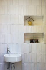 If you don’t have to have cabinetry installed or shelves drilled onto your bathroom walls, one good idea is to create recessed wall shelves for storage. This will help conserve floor space. You can even create recessed wall in corners.