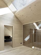 The ceilings of the attic slope downwards towards the level of the cullis to create a more cloistered atmosphere.