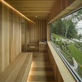 A sauna that looks out to the lake.