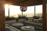 The lounge area makes a superb place to witness the sun set for the day. The basket weave pendant is from Tower 20 Venice.