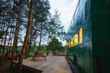 Exterior, Metal Siding Material, and Camper Building Type The bus is "parked" in a peaceful, wooded site in the Surrey countryside.  Search “countryside” from This Double-Decker Bus Offers an Eclectic Glamping Experience