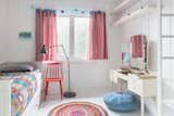 Kids Room, Bed, Chair, Pre-Teen Age, Dresser, Shelves, Lamps, and Bedroom Room Type Colorful bed spreads and rugs make this a cool bedroom for kids.  Photo 11 of 13 in Relax and Recharge at This Charming Norwegian "Hytte" Rental
