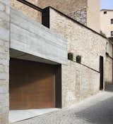 Garage and Garage Conversion Room Type The property has a discreet, wooden door garage.  Photo 3 of 15 in A Spanish Architect Transforms a Medieval Townhouse Into a Stunning Rental