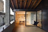 A spacious wood-decked veranda that's part of the duplex apartment.