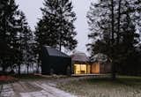 Exterior, Wood Siding Material, Cabin Building Type, and House Building Type The three cabins have north-facing windows that frame views of the Baltic Sea.  Photo 3 of 13 in This Forest Retreat Is a Modern Take on the Traditional Estonian Hut