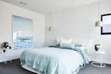 This light blue bedroom was inspired by the home's coastal location.