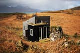 Exterior, Cabin Building Type, Green Roof Material, Shed RoofLine, Wood Siding Material, and Tiny Home Building Type Pig Rock Bothy and Inshriach Bothy are tow of the handcrafted structures that inspire artists who use it a residency spaces.  Photos from 10 Adorable Tiny Homes You Can Rent Right Now