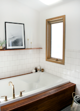 For a while, Goldman could not decide between free standing bathtub and a built-it, but was sold on a built-in when she saw inspiration photos of wood panelled tubs.